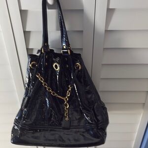 Black and Gold Shoulder Bag with Elegant Hardware